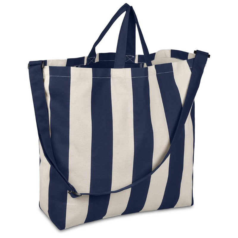 Navy and white striped tote bag on a white background