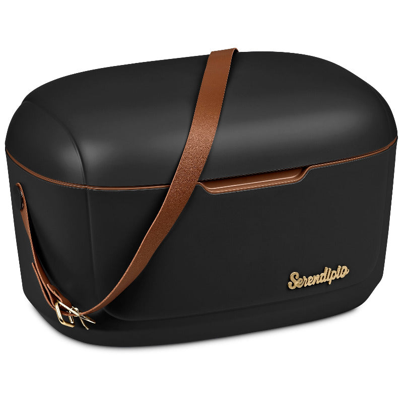 Black hard plastic cooler box with tan vegan leather strap on white background