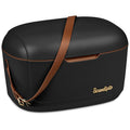 Black hard plastic cooler box with tan vegan leather strap on white background