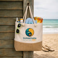 Beige tote bag with 'Sunwoven' logo on a beach setting